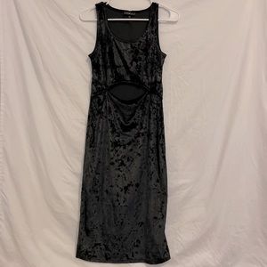 Velvet black dress, never worn and has a belly opening